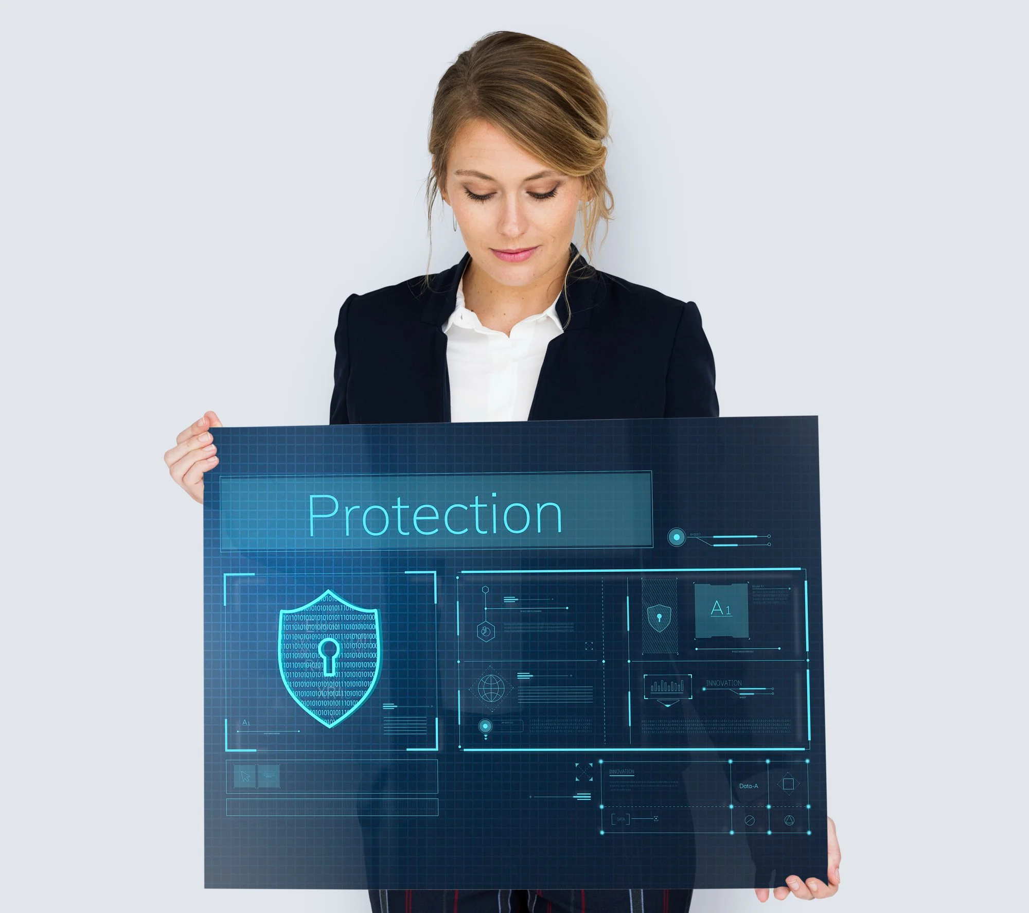 A woman holding a digital screen displaying "Protection" and a padlock icon, symbolizing comprehensive cybersecurity and data safeguarding.